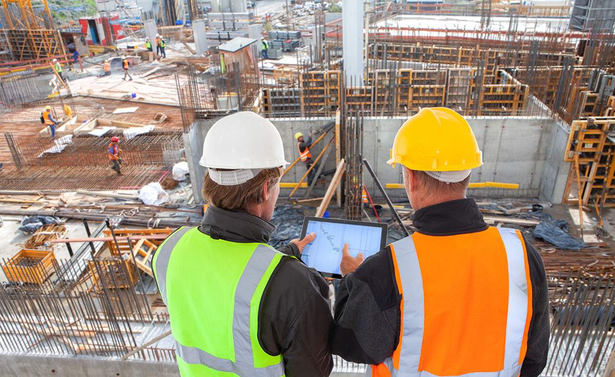 A team of construction workers collaborating on a job site